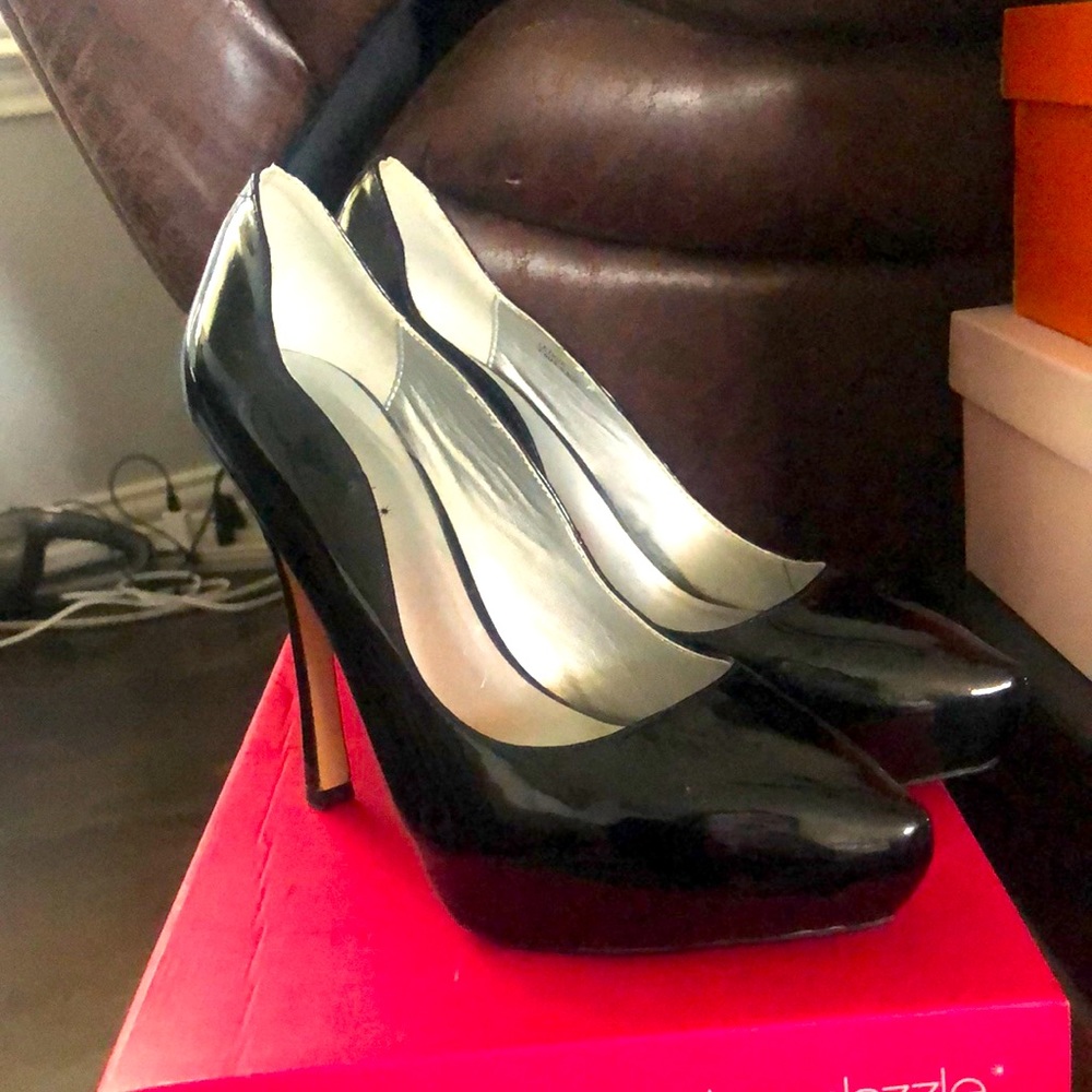 Black leather pumps